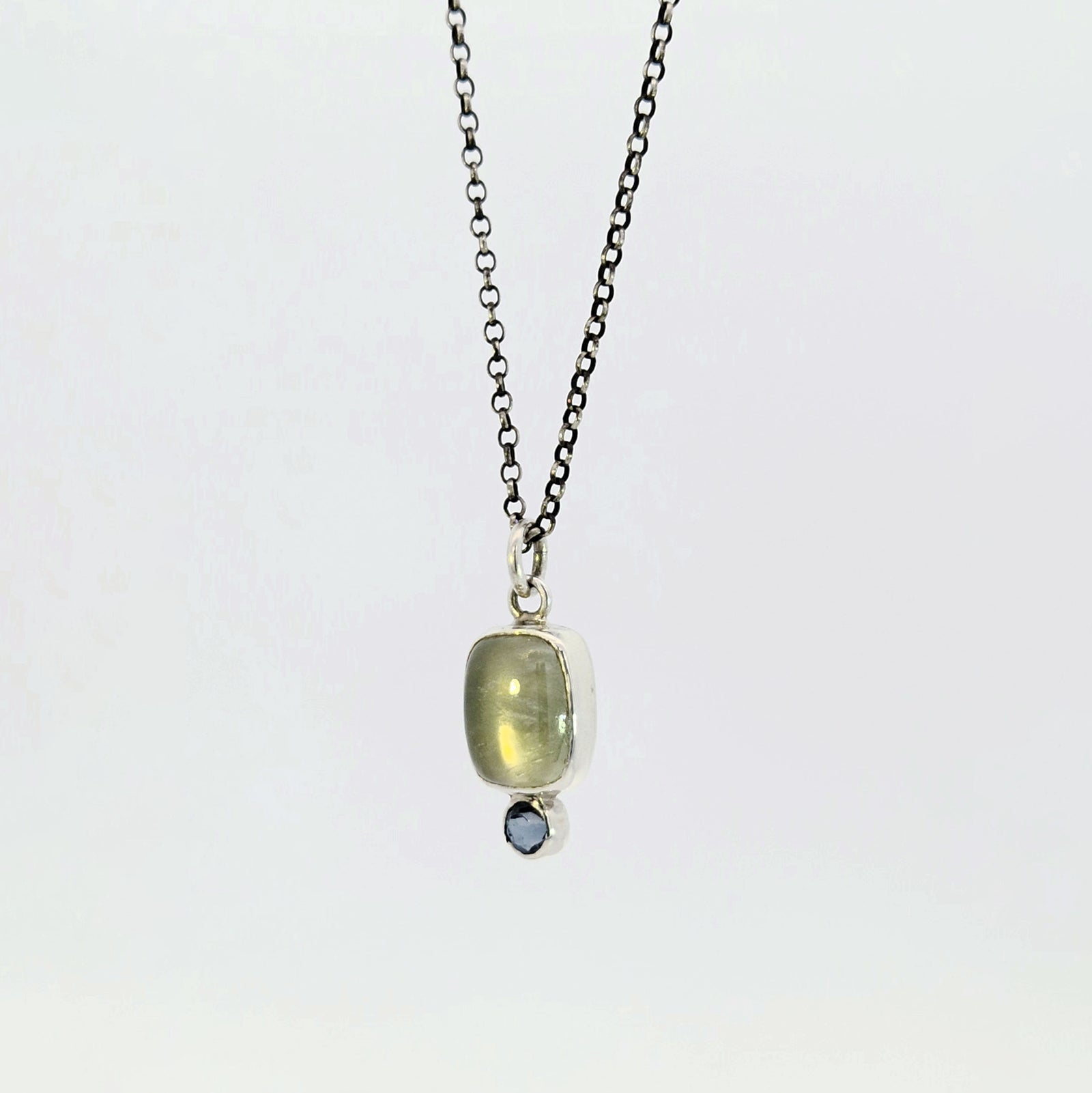 Prehnite and blue topaz pendant in sterling silver