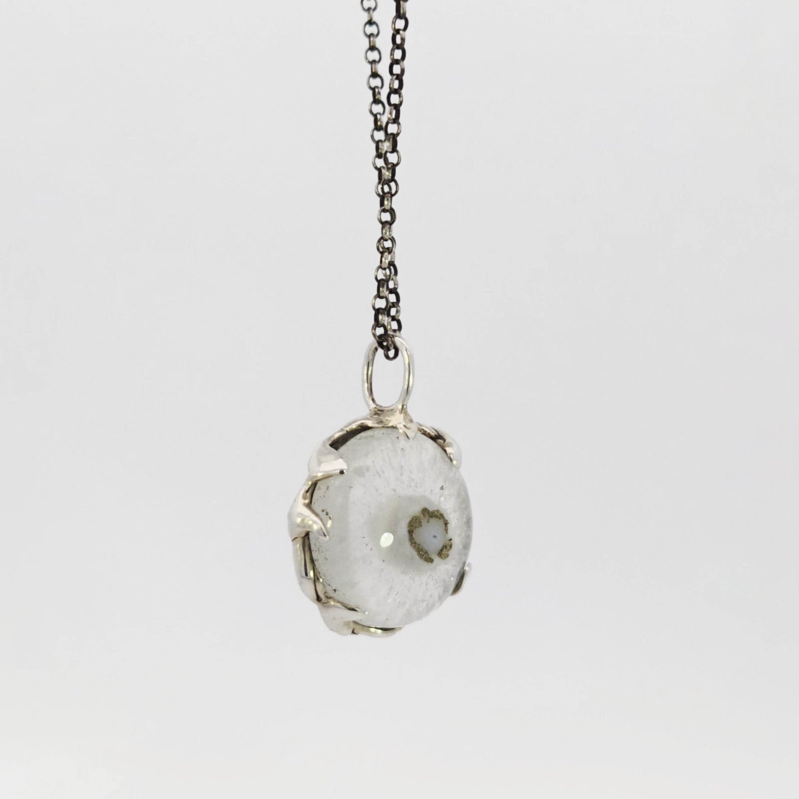 Solar quartz 'eye' pendant