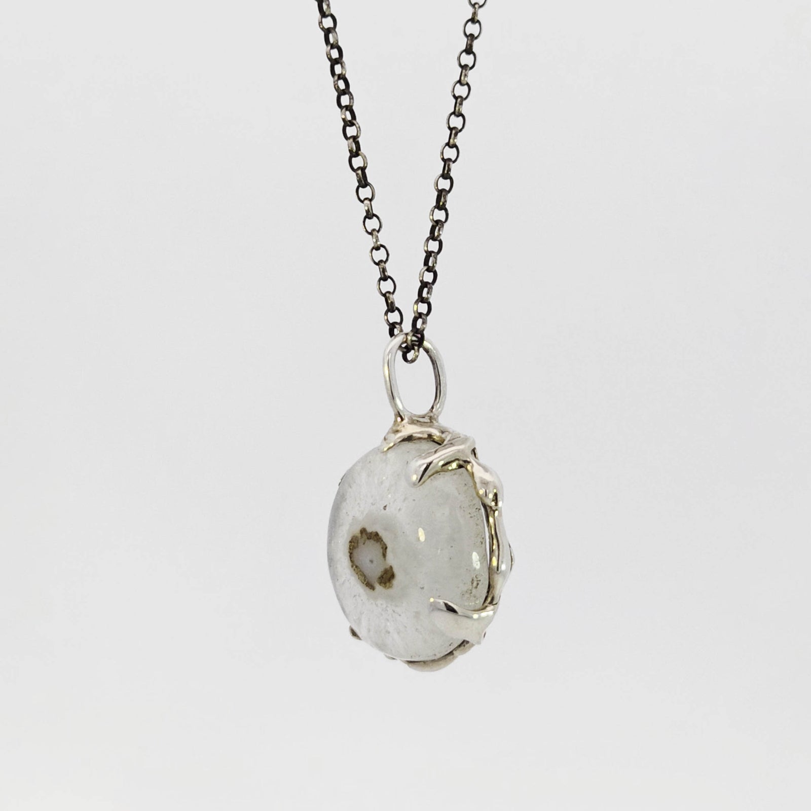 Solar quartz 'eye' pendant