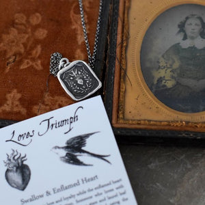 Loves Triumph - Swallow and Enflamed Heart Necklace