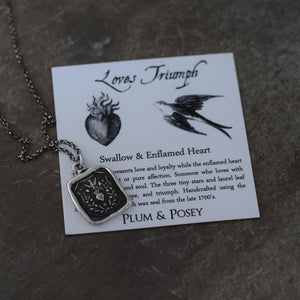 Loves Triumph - Swallow and Enflamed Heart Necklace