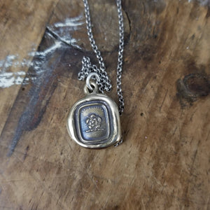 Heraldic Rose - Do the right thing in bronze