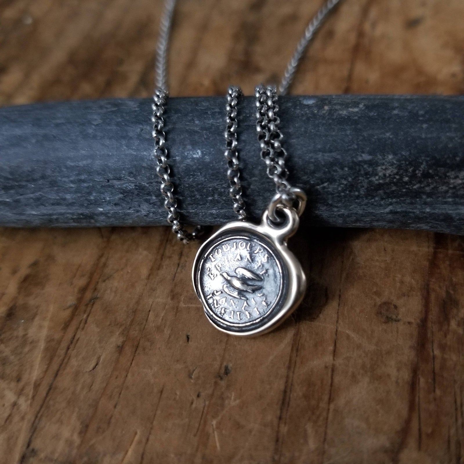 Swallow - Always Wandering Love and Loyalty in bronze