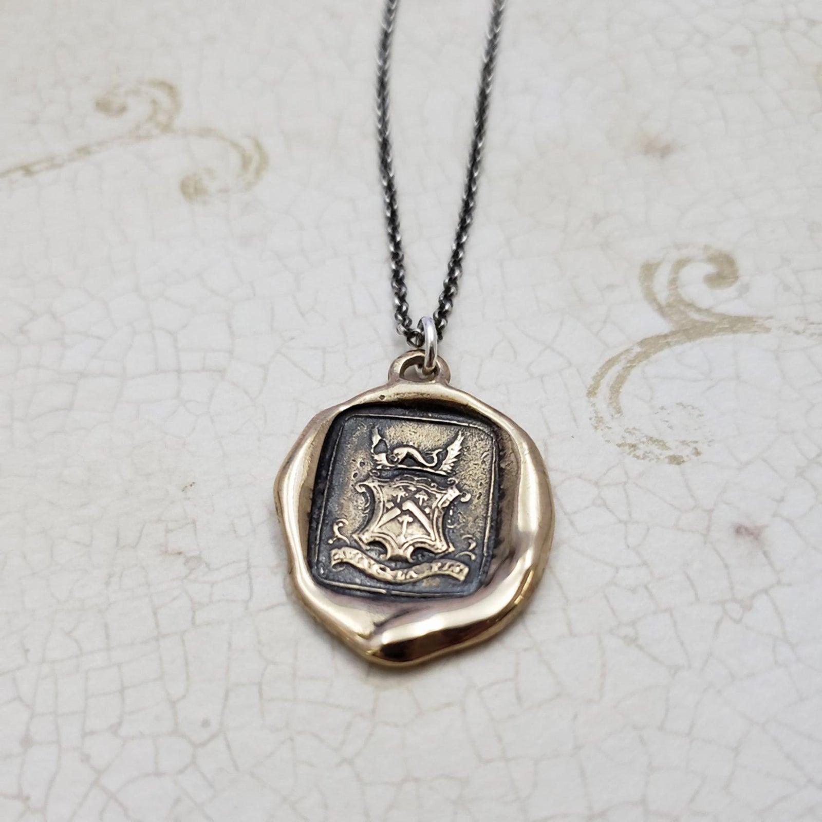 Dolphin Crest ~ Consider the End in Bronze