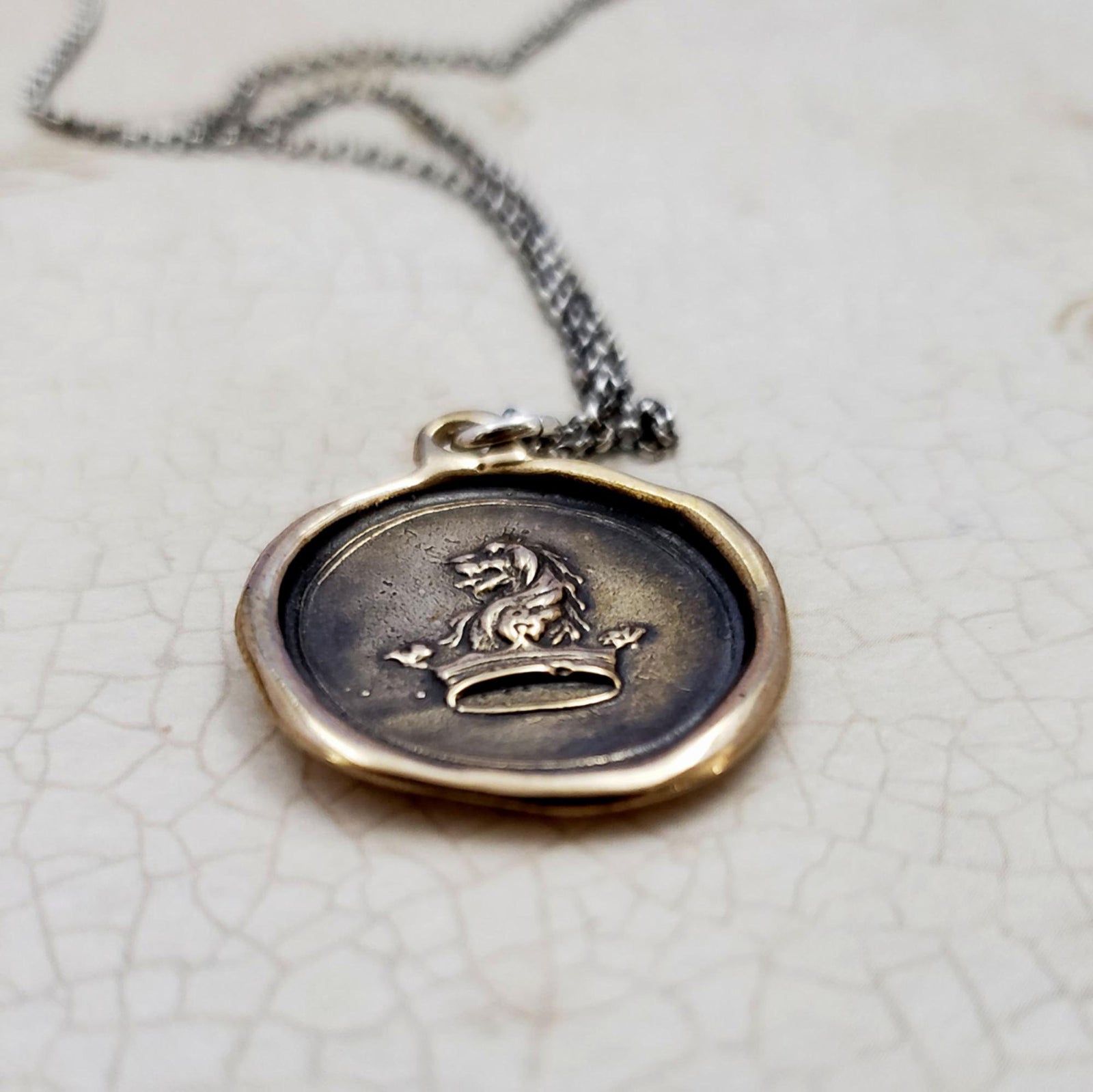 Lion and Crown - Courage to Dream pendant in bronze