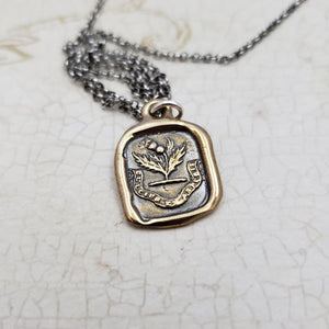 Sweeter after difficulties Thistle necklace in Bronze