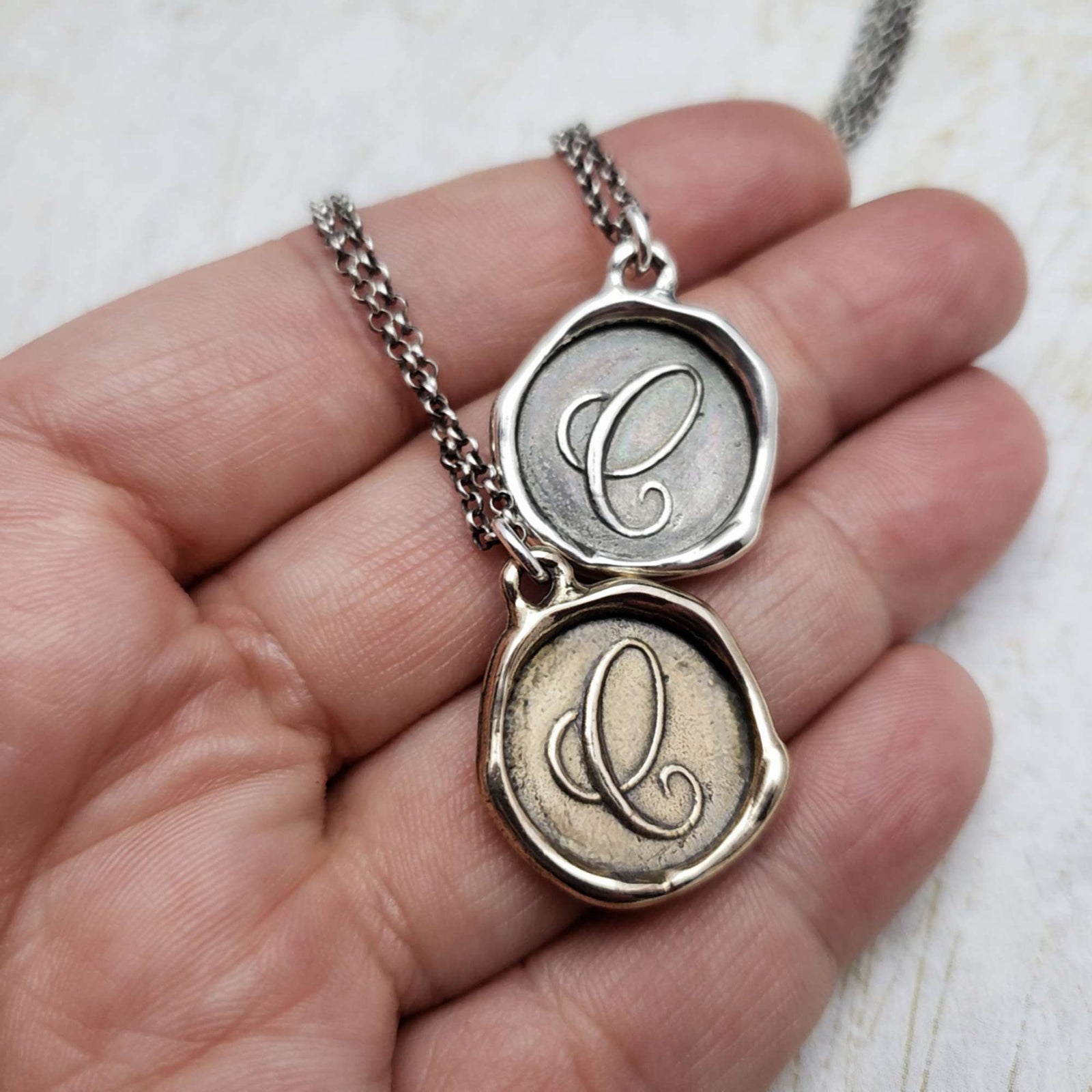 Initial C in Bronze