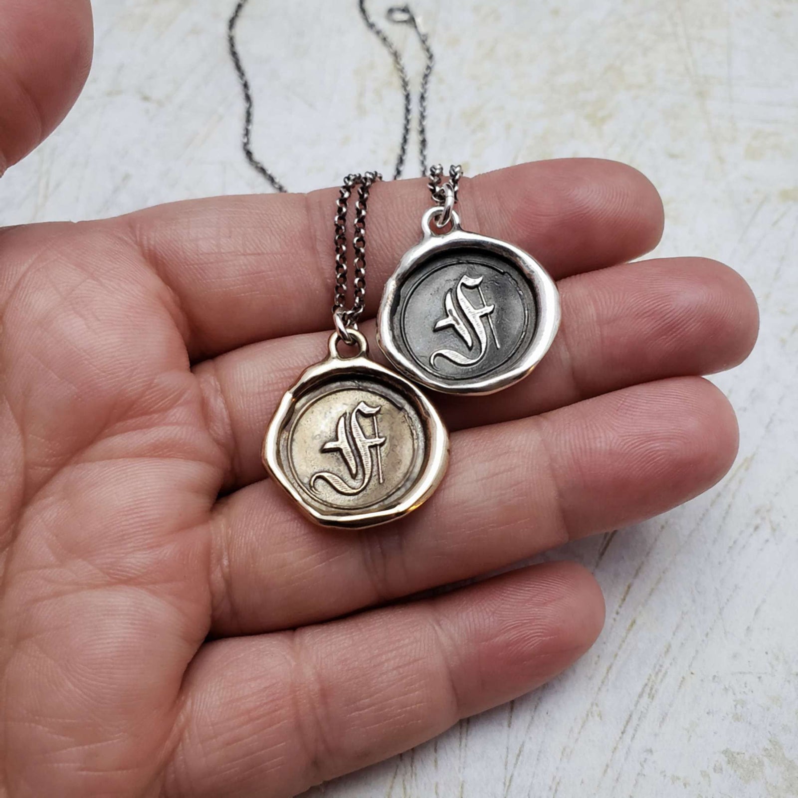 Initial F in Bronze