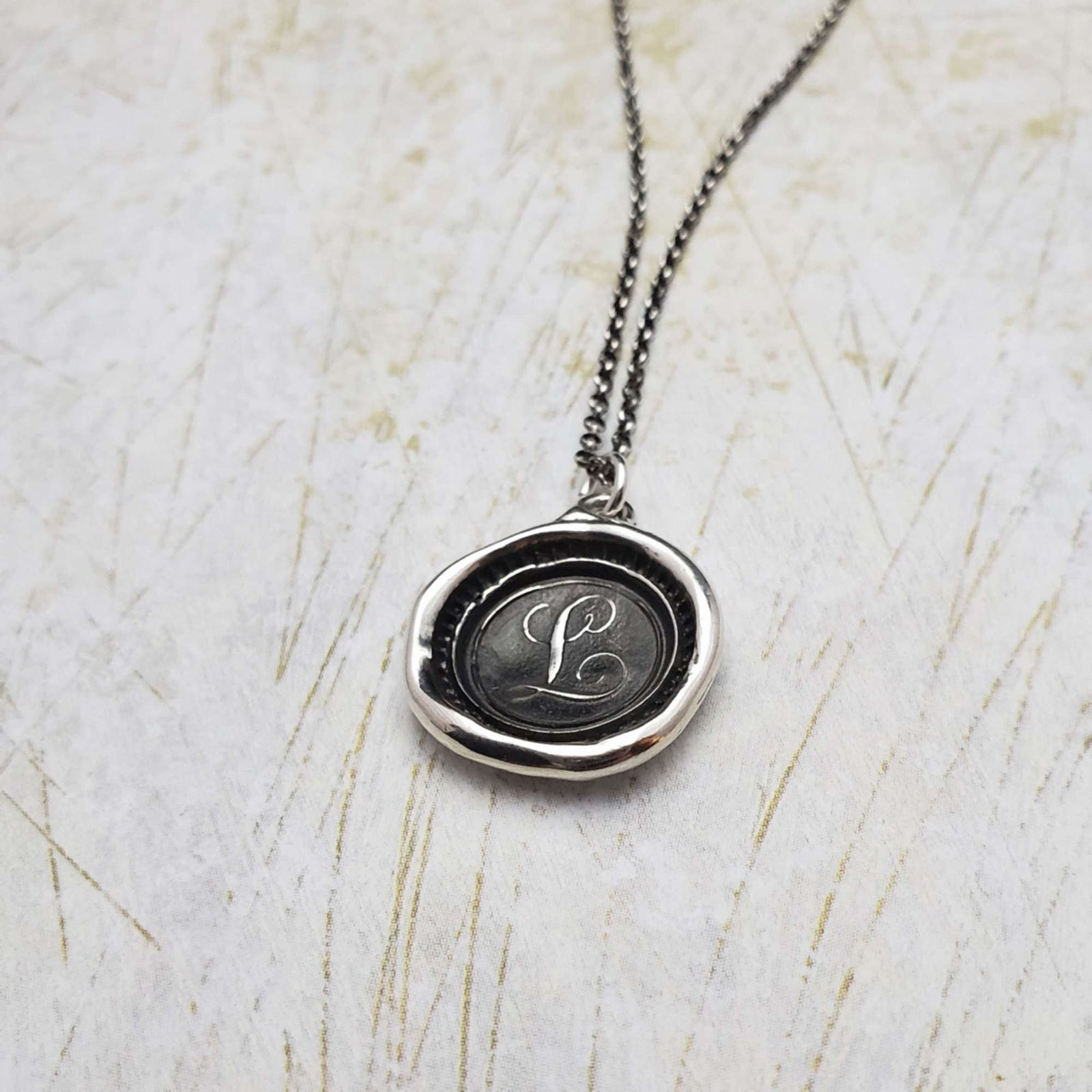 Initial L
