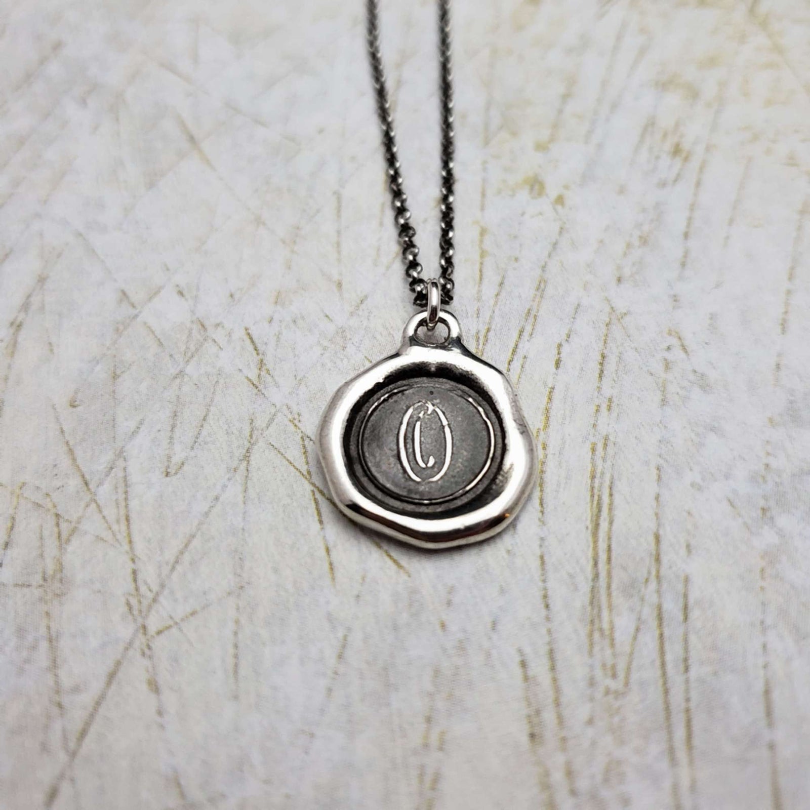 Initial O