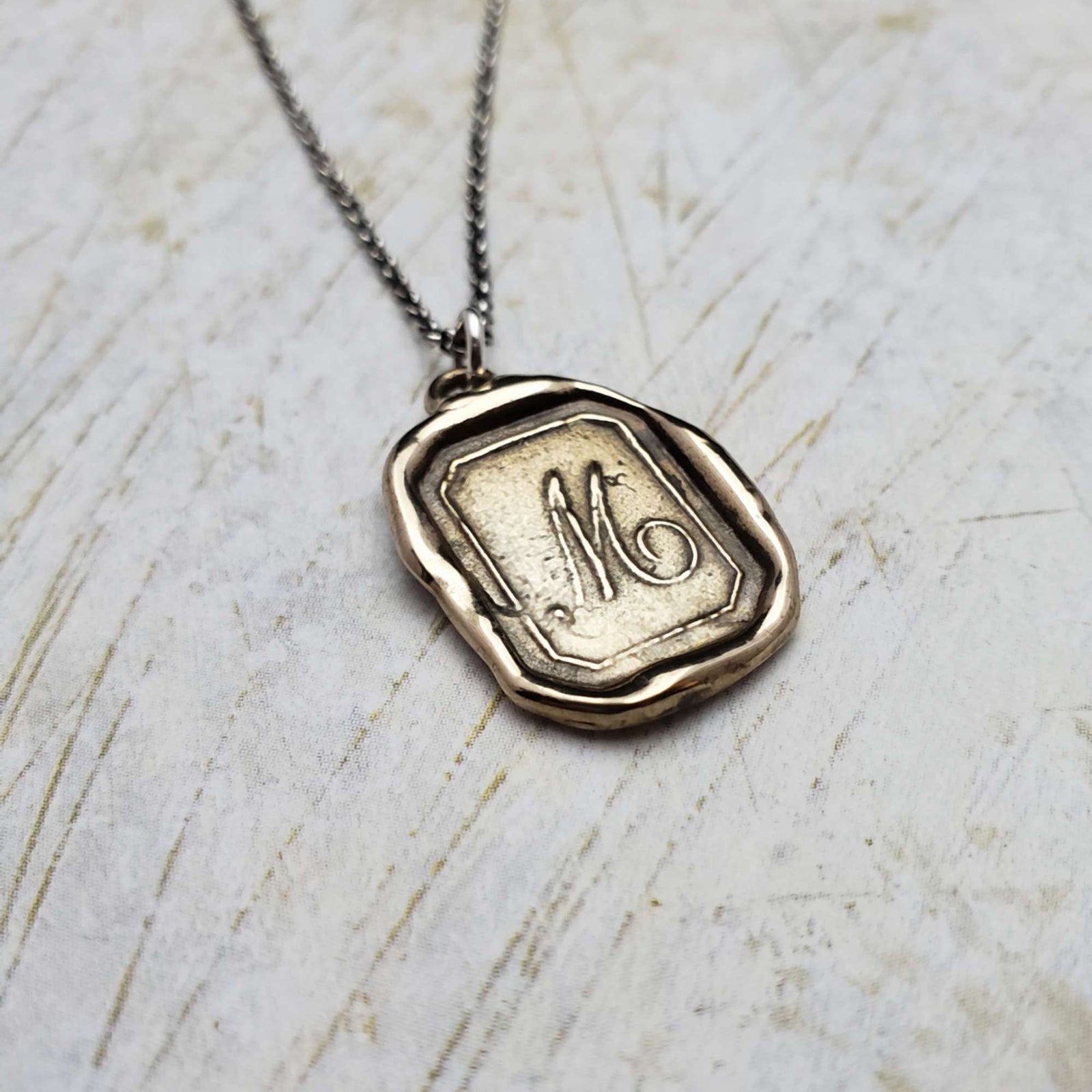 Letter M in Bronze