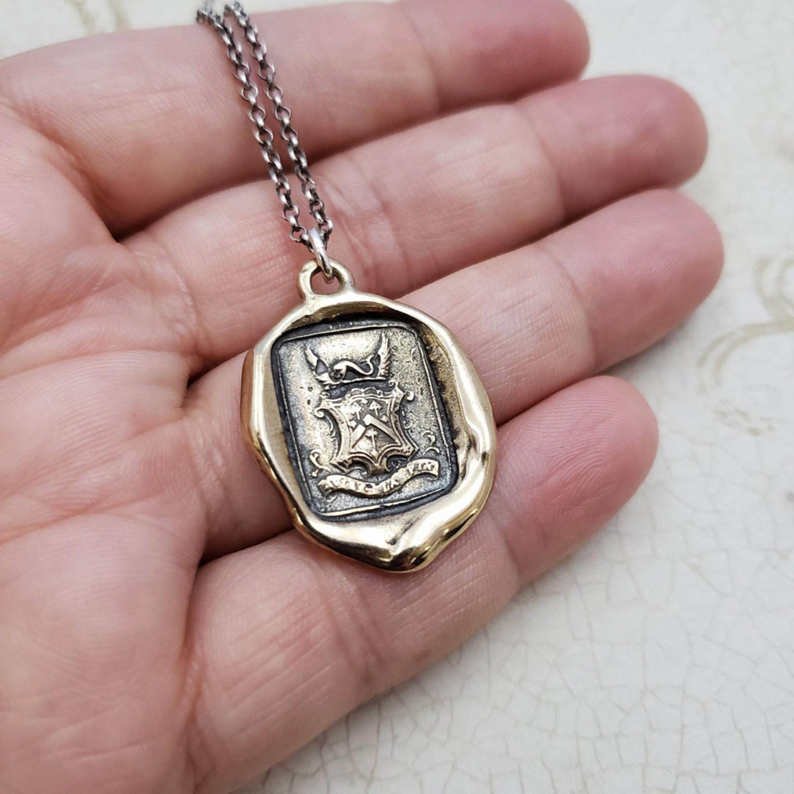 Dolphin Crest ~ Consider the End in Bronze