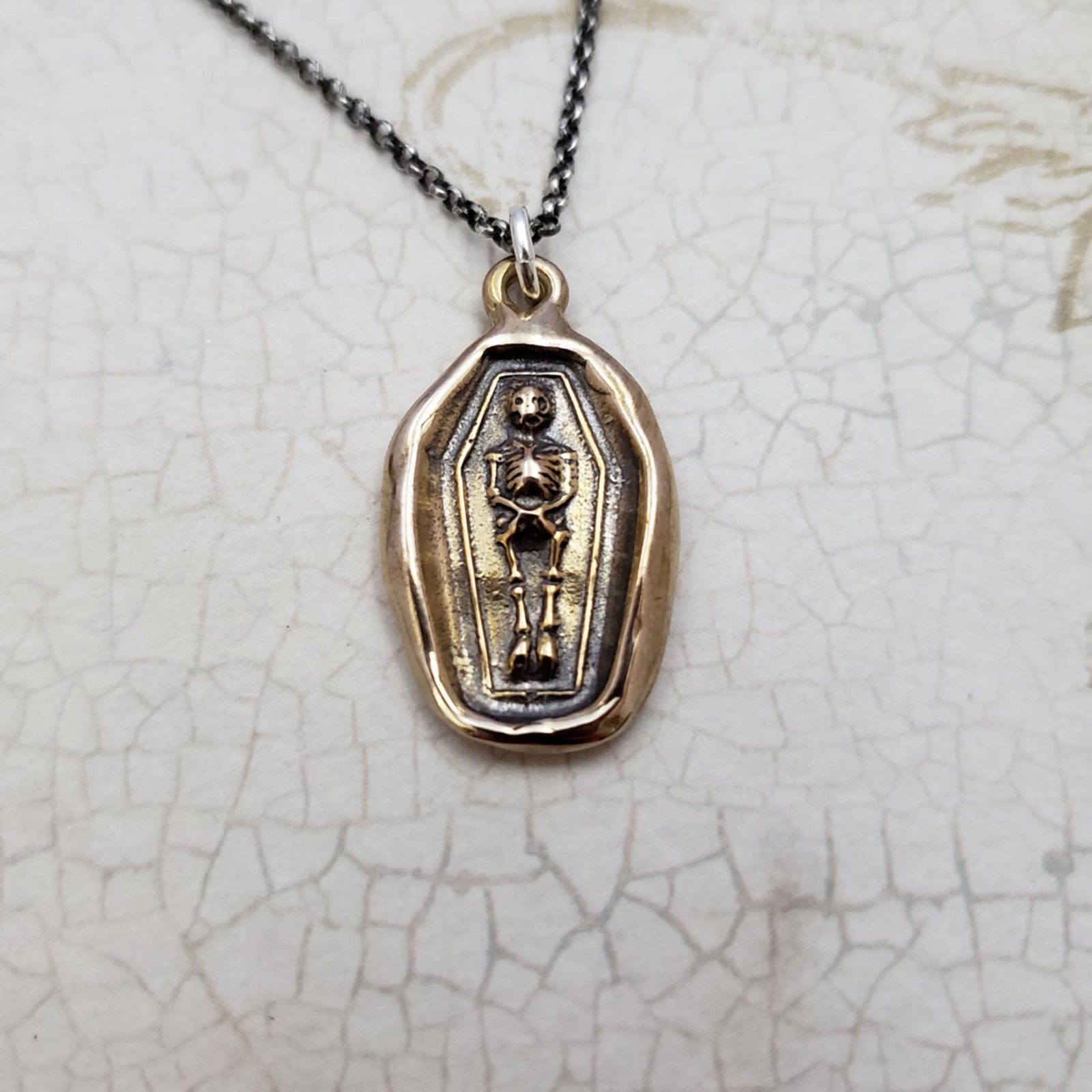 Skeleton Wax Seal Necklace in Bronze