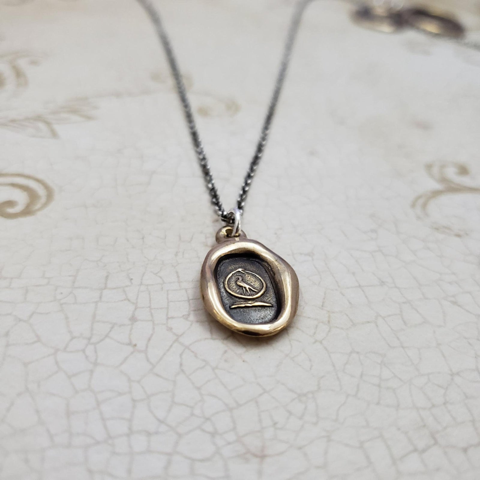 Swallow and Serpent Eternal Loyalty Necklace in Bronze