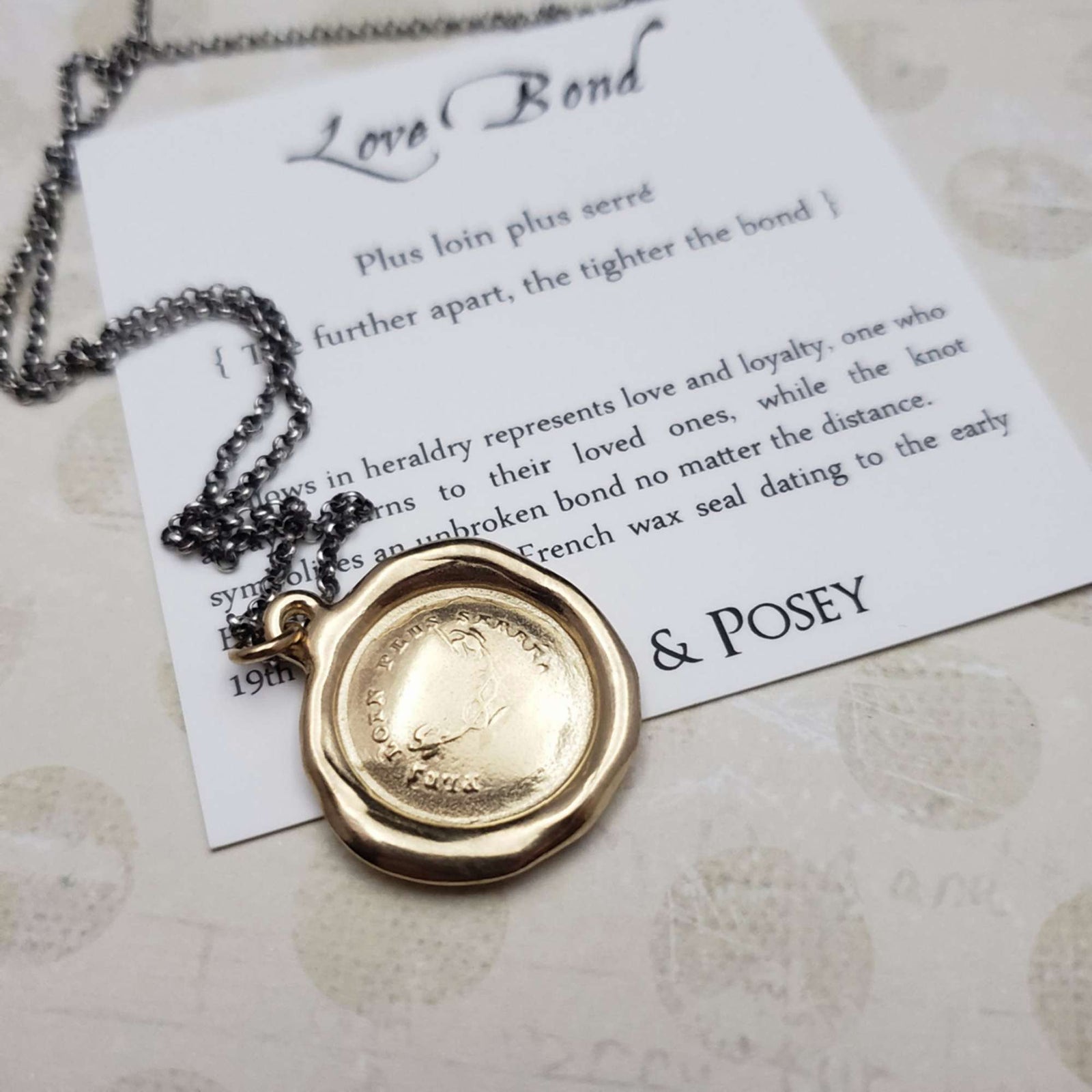 Swallow & Love Knot - The further apart, the tighter the bond in Gold Vermeil