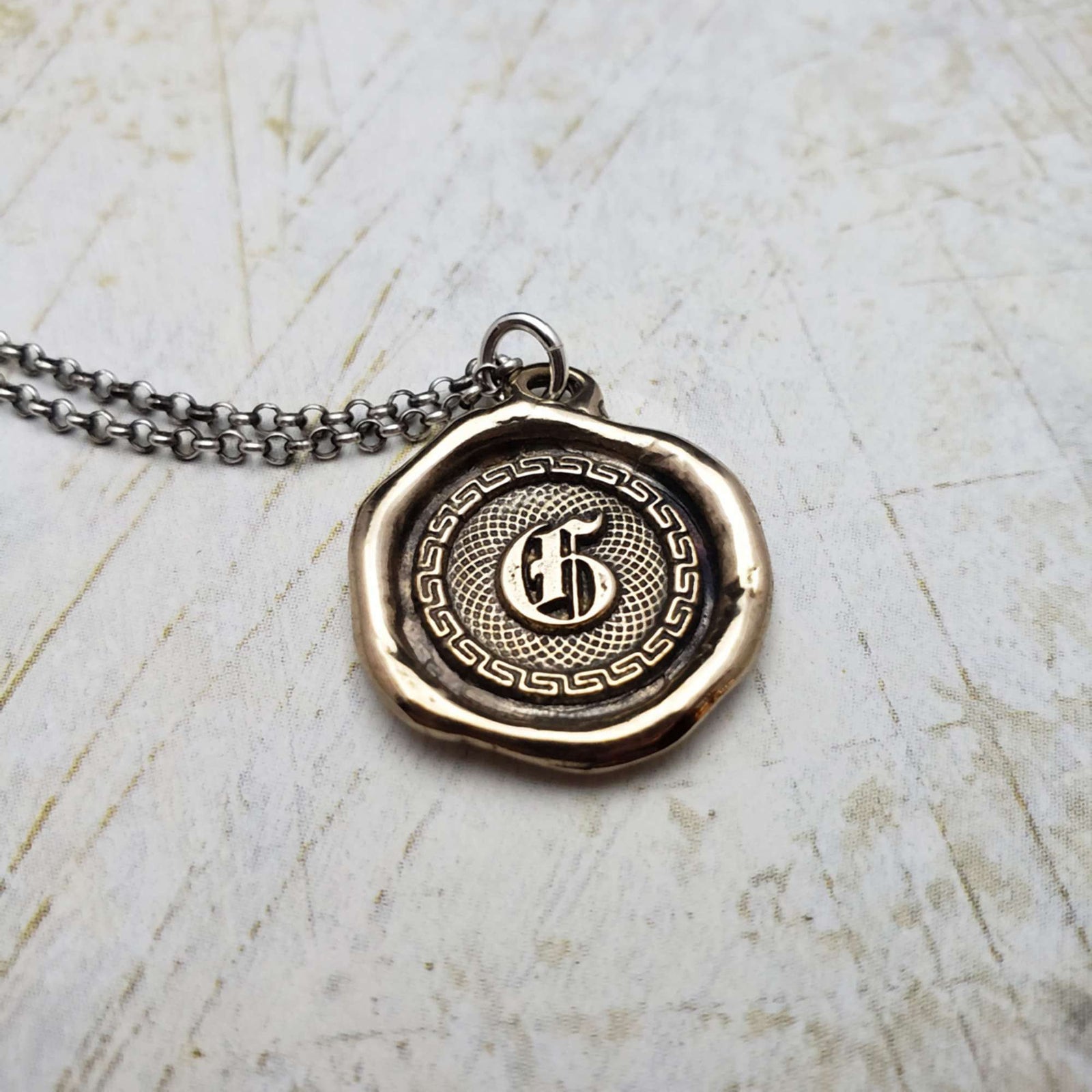 Letter G in Bronze