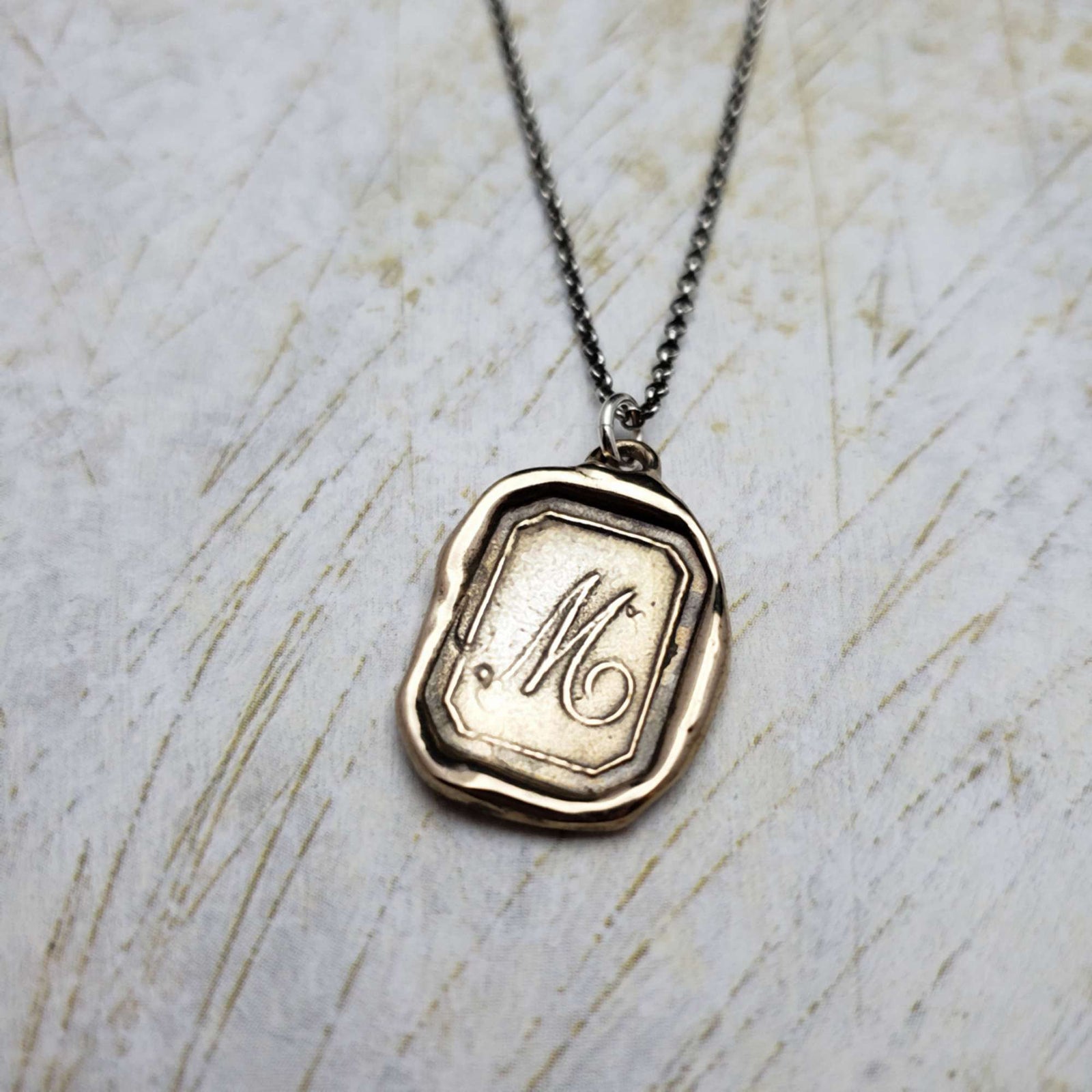 Letter M in Bronze