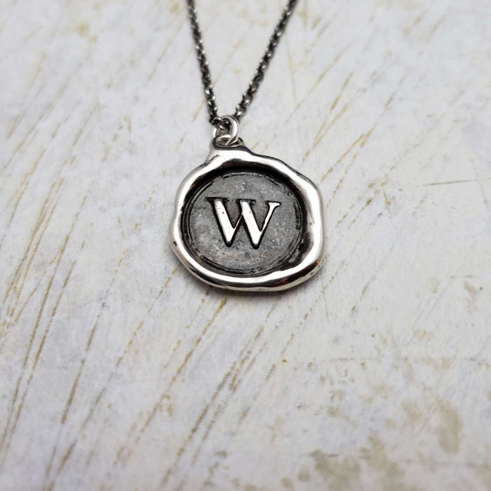 Initial W