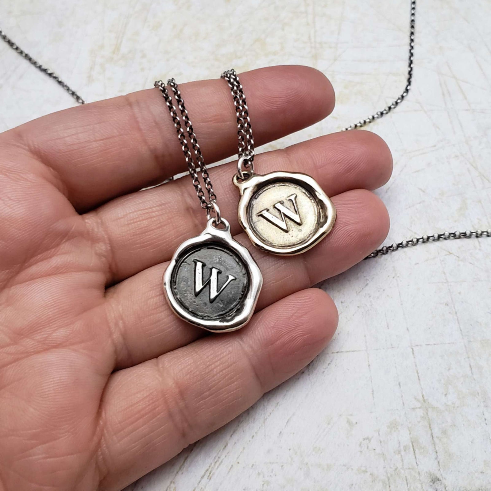 Initial W in Bronze