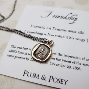 Friendship is love without his wings in bronze