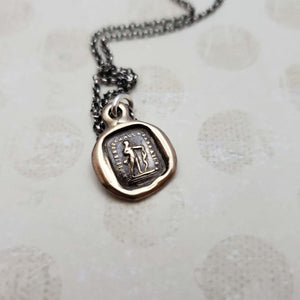 Friendship is love without his wings in bronze