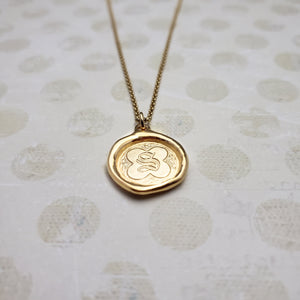 Letter S in gold vermeil