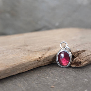 Garnet pendant in sterling silver bezel