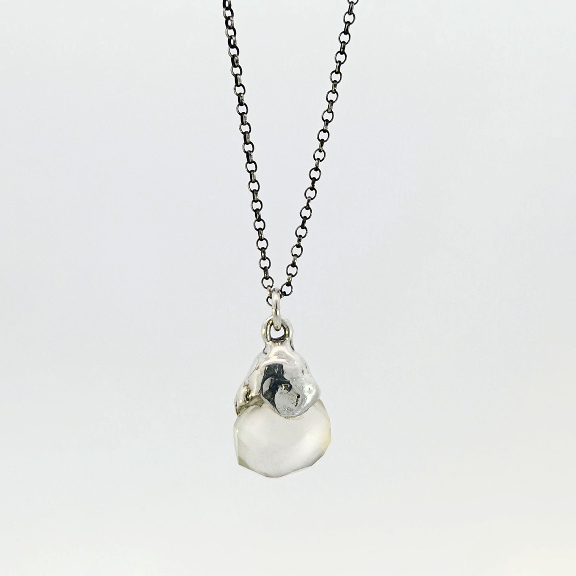 Grey chalcedony pendant with sterling silver cap