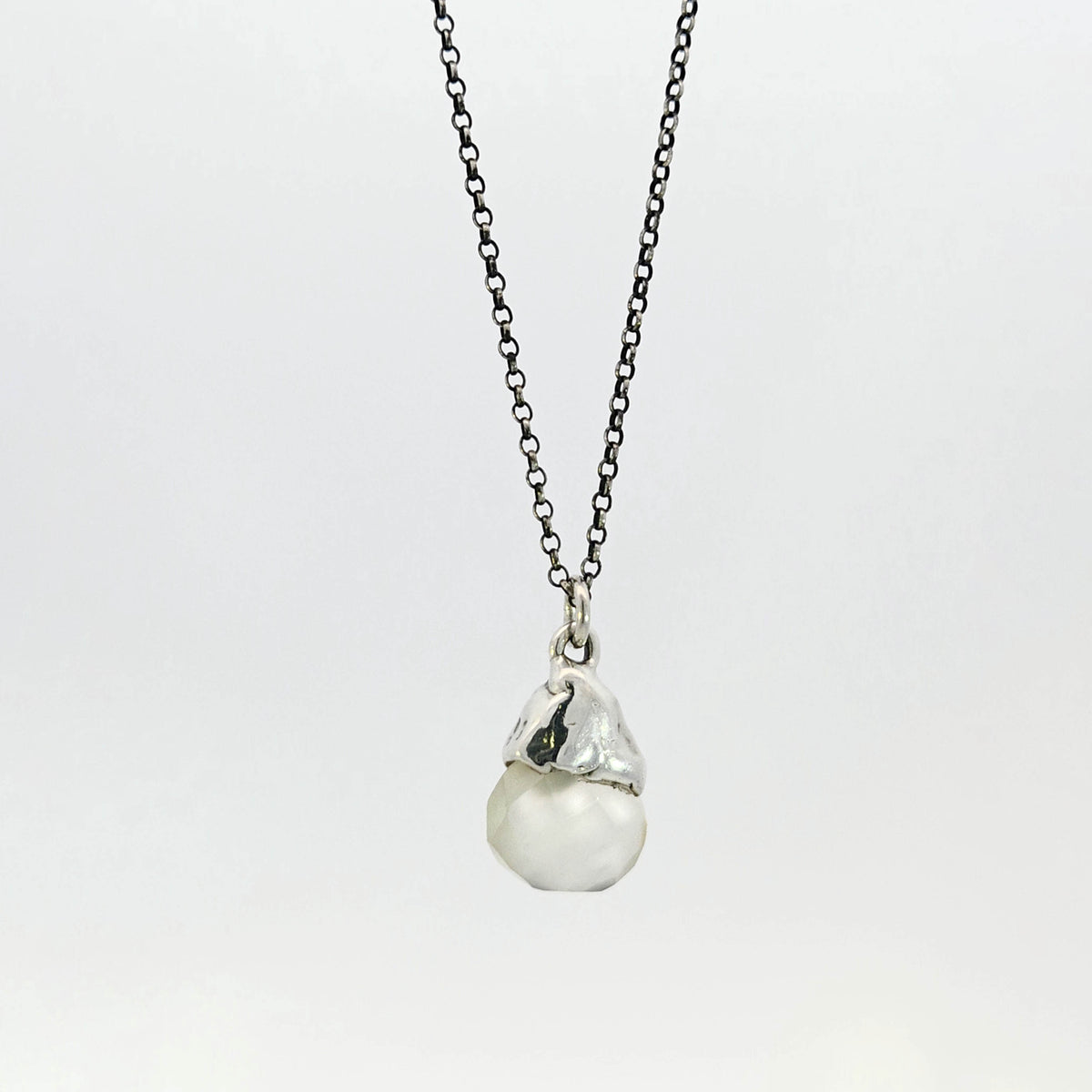 Grey chalcedony pendant with sterling silver cap