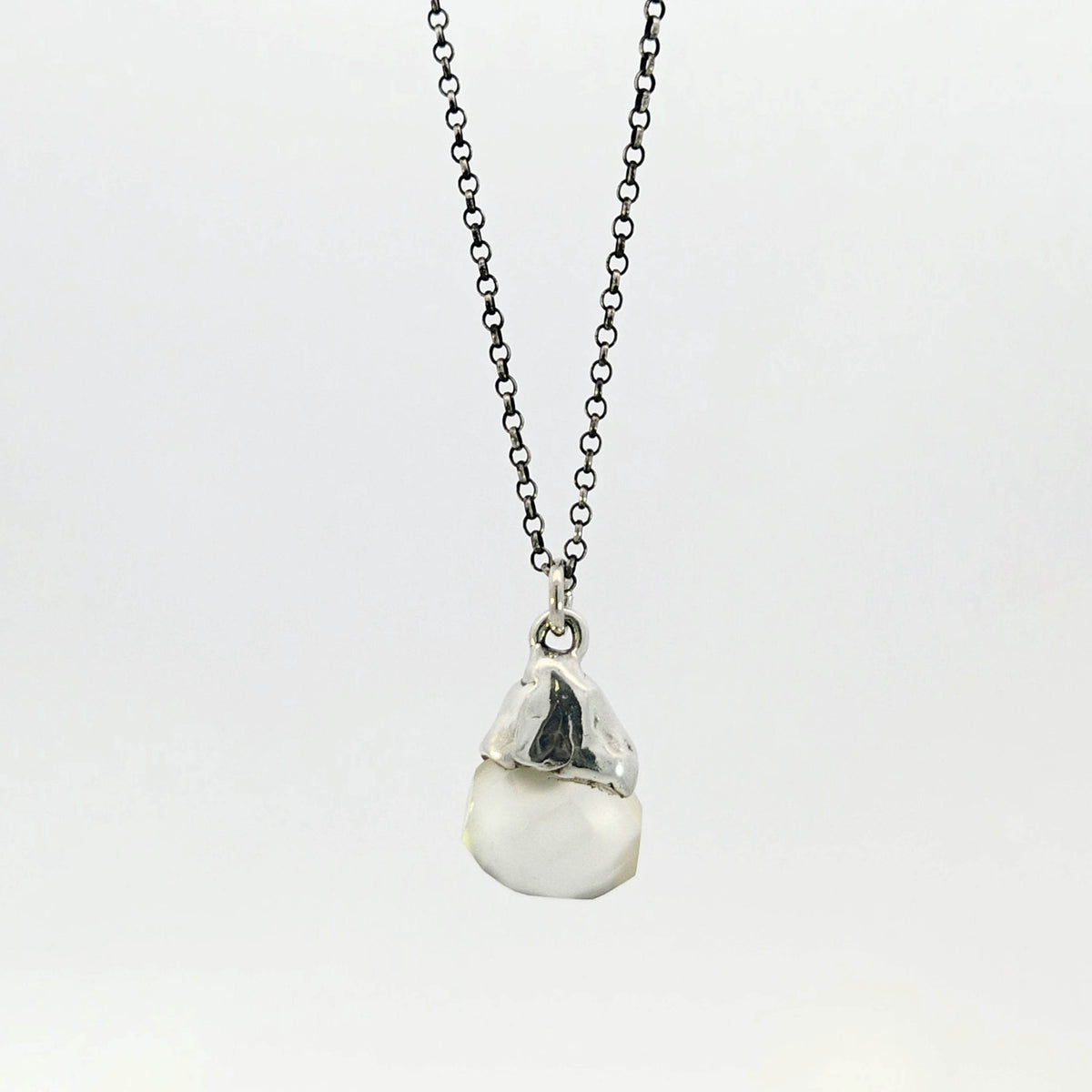 Grey chalcedony pendant with sterling silver cap