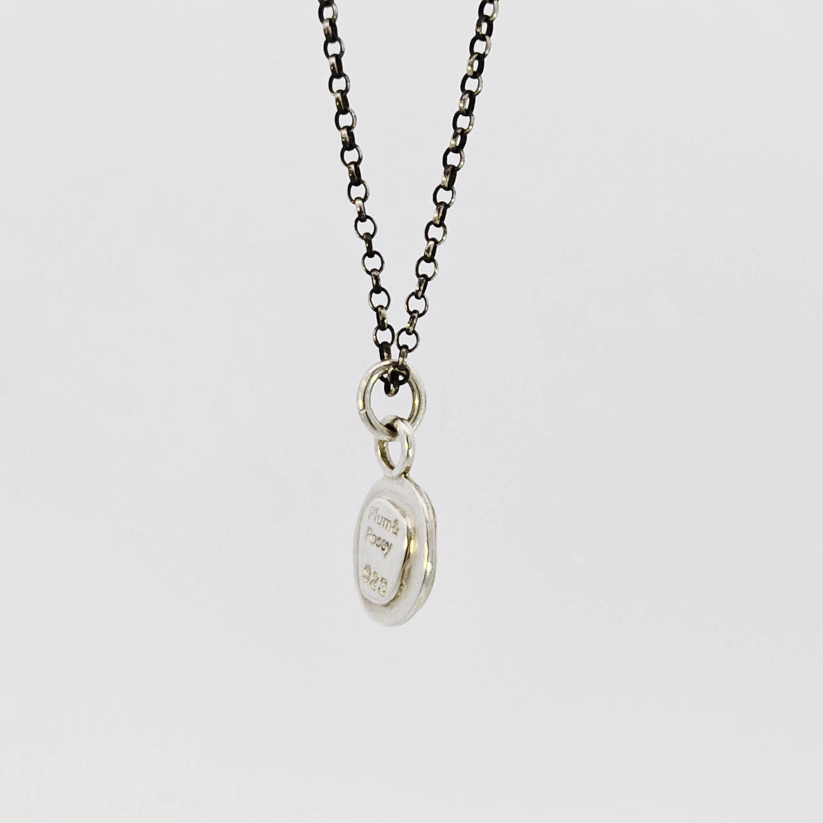 Garnet pendant in sterling silver bezel