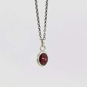 Garnet pendant in sterling silver bezel