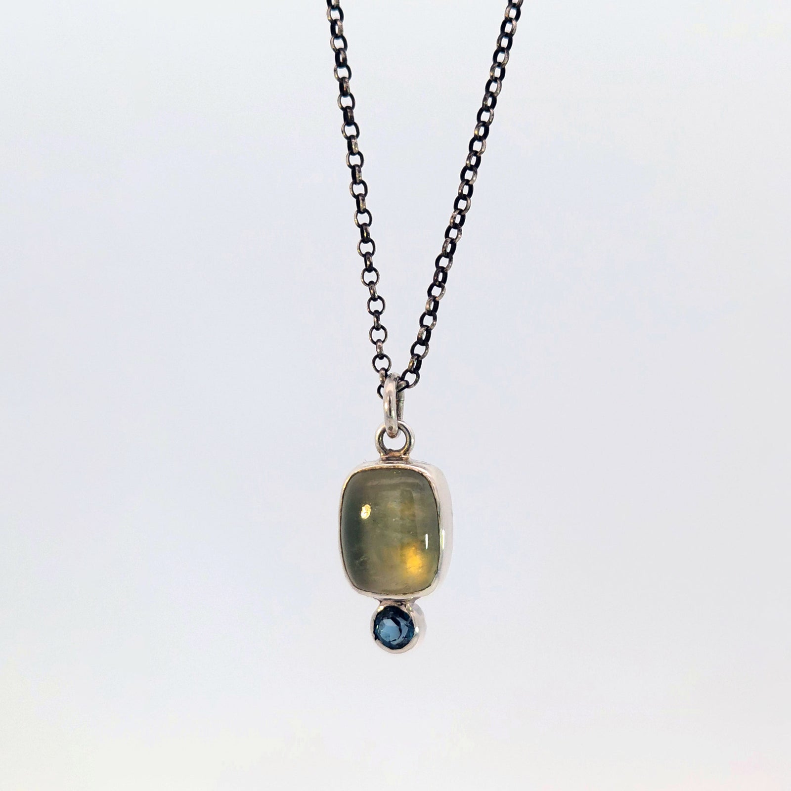 Prehnite and blue topaz pendant in sterling silver