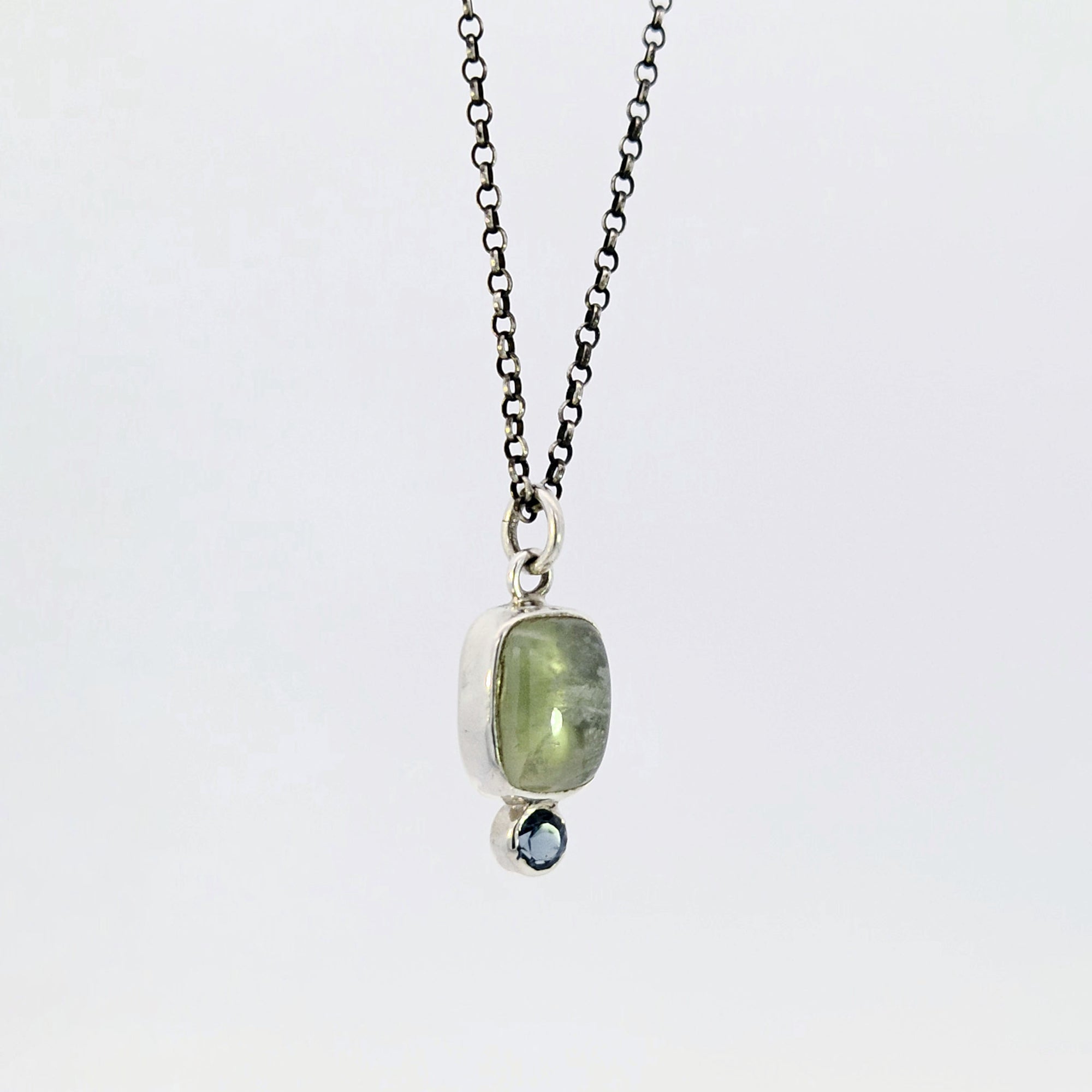 Prehnite and blue topaz pendant in sterling silver