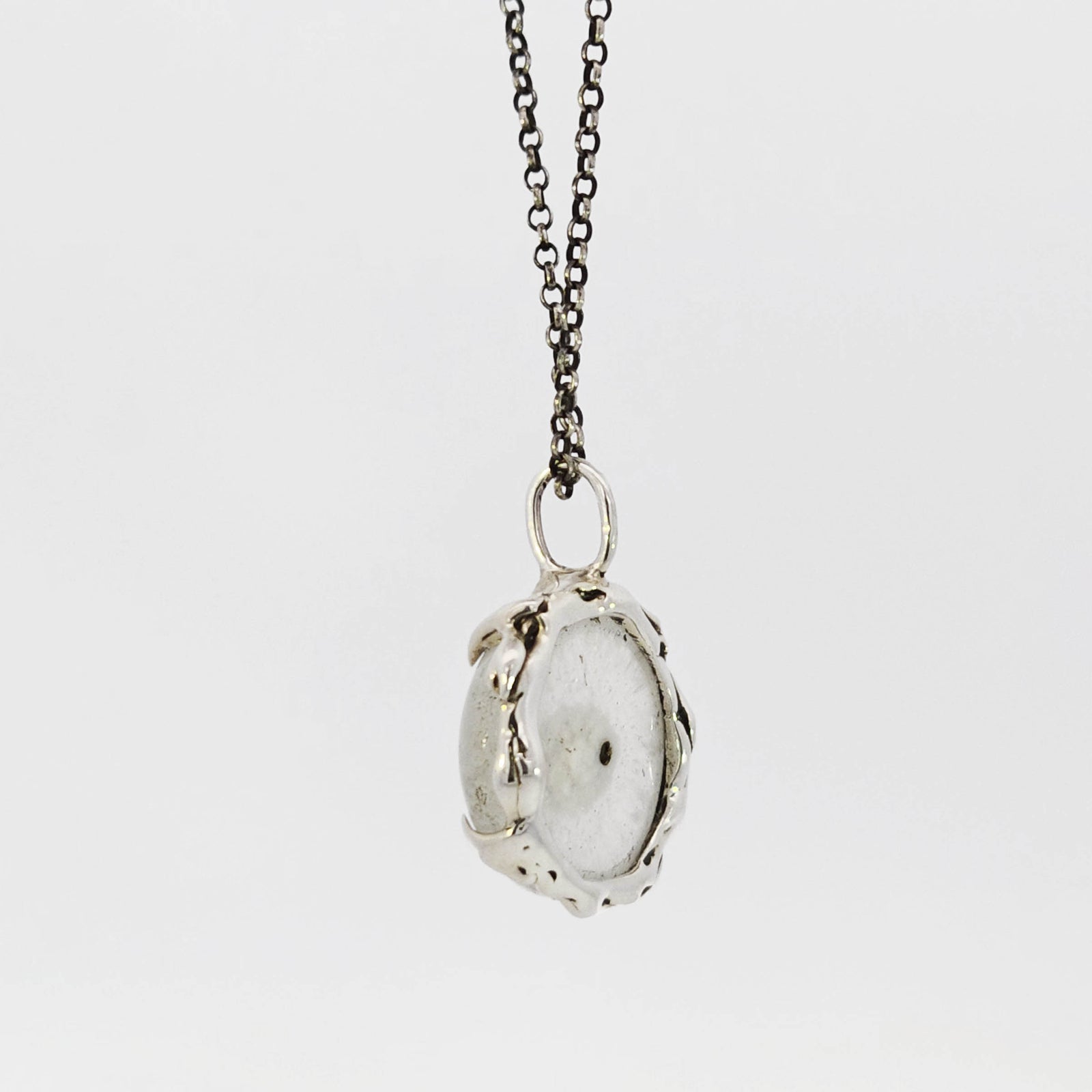 Solar quartz 'eye' pendant