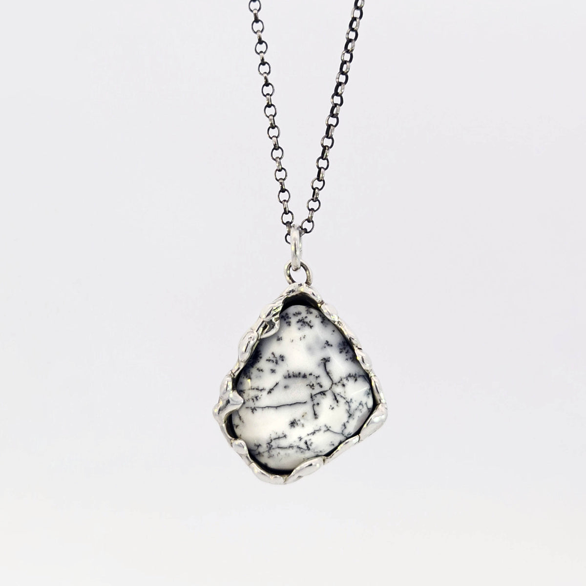 Dendritic opal pendant in organic sterling bezel
