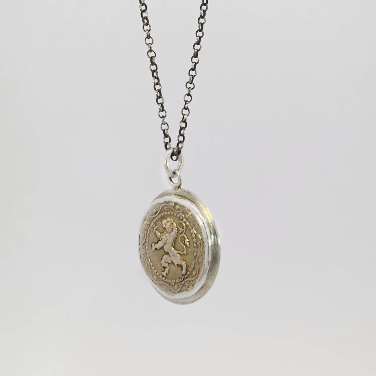 Belgian coin impression pendant in sterling silver