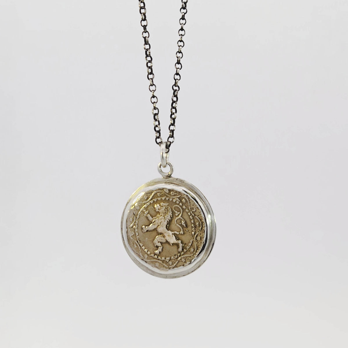 Belgian coin impression pendant in sterling silver