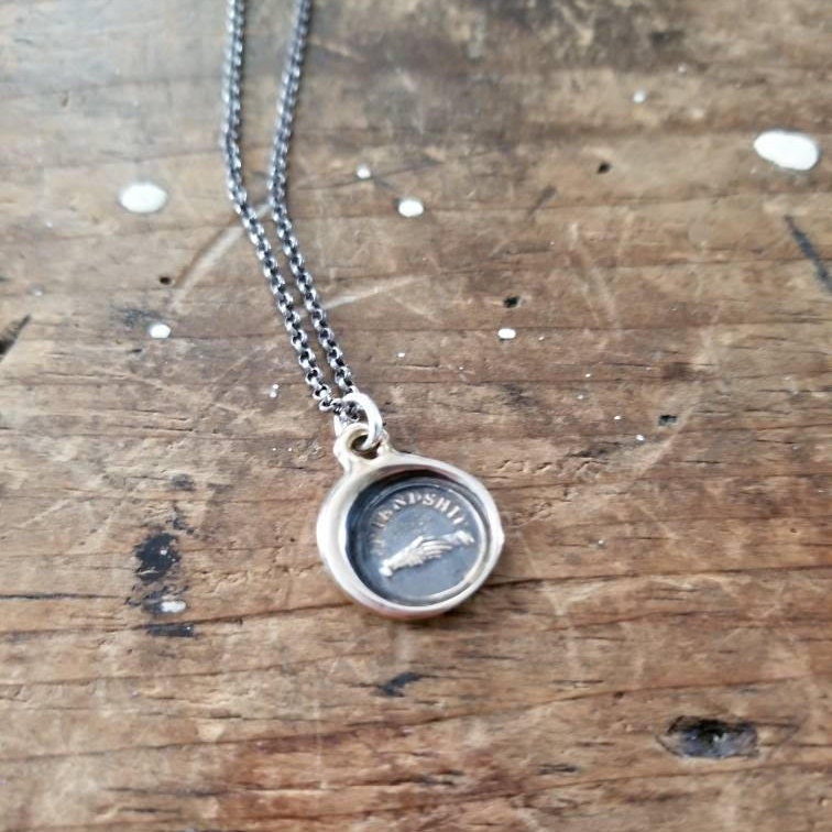 Clasped Hands - Friendship in bronze