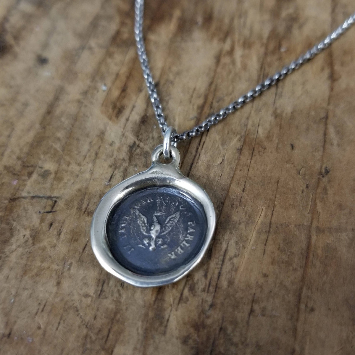 Eagle -  Deeds not words in bronze