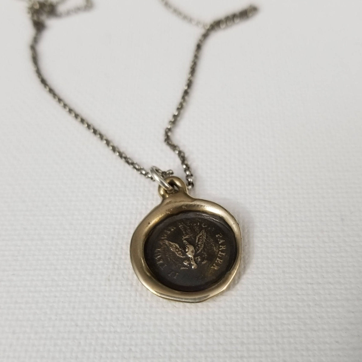 Eagle -  Deeds not words in bronze