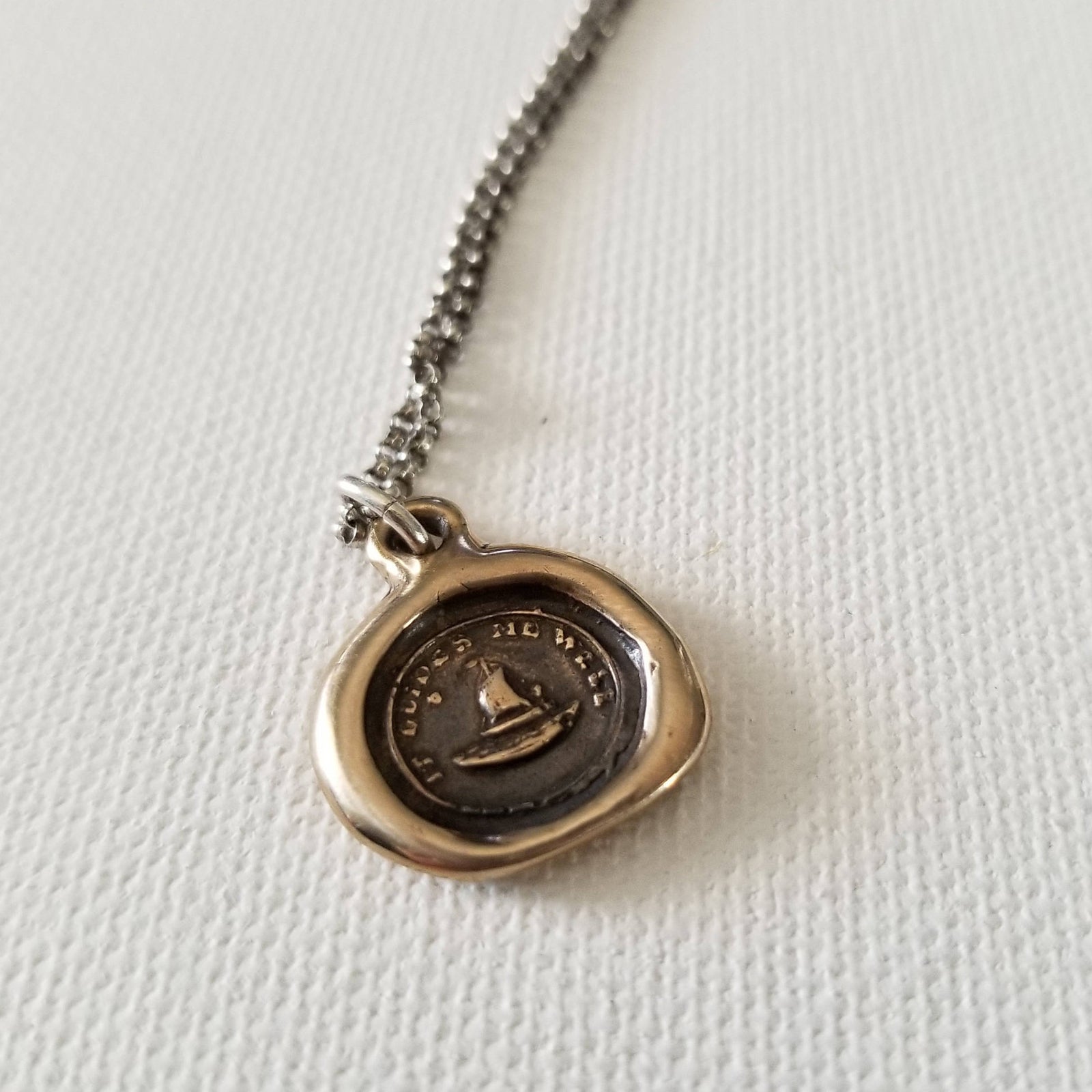 Bronze Cupid's Sailing Boat and North Star - It Guides me well