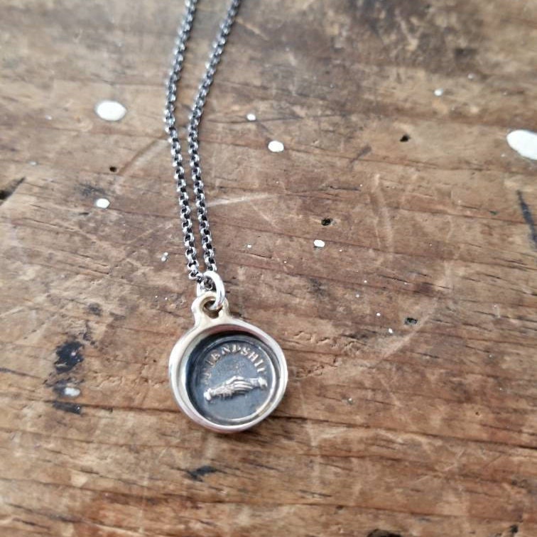 Clasped Hands - Friendship in bronze