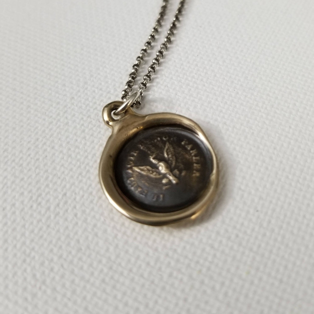 Eagle -  Deeds not words in bronze