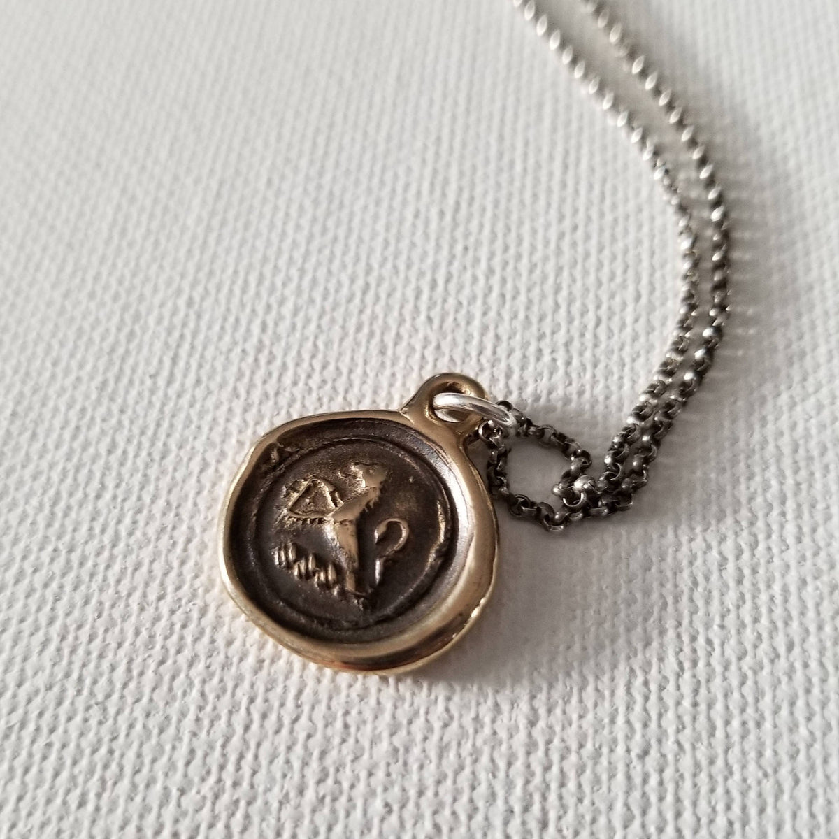 Lion Crosslet Fitchee in bronze