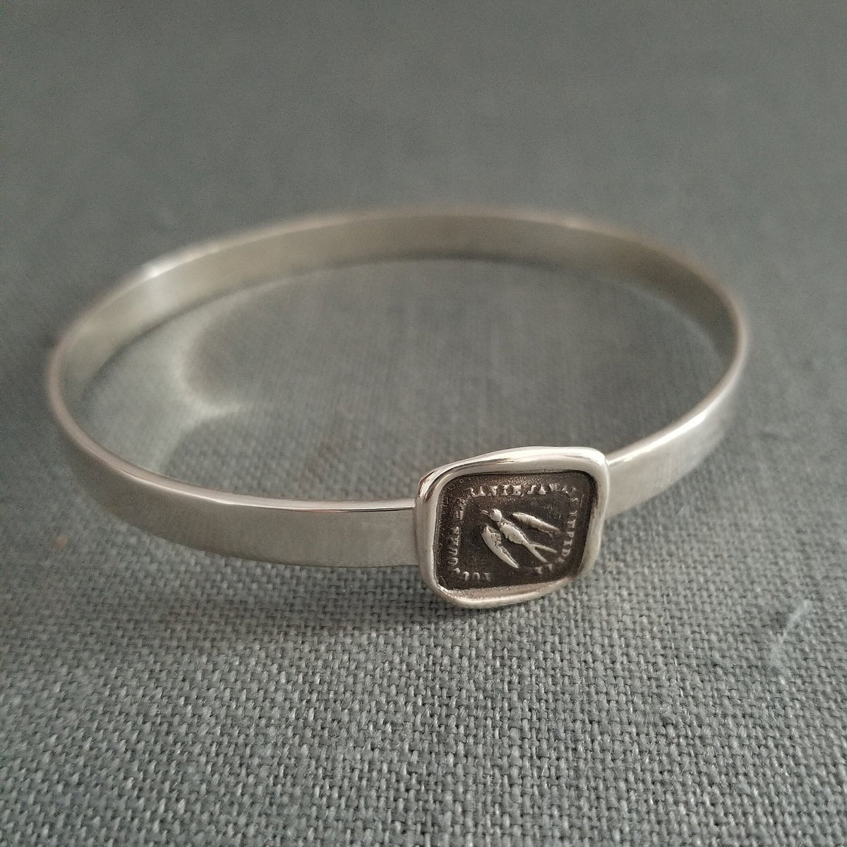 Swallow Wax Seal Bangle - Always wandering, never unfaithful