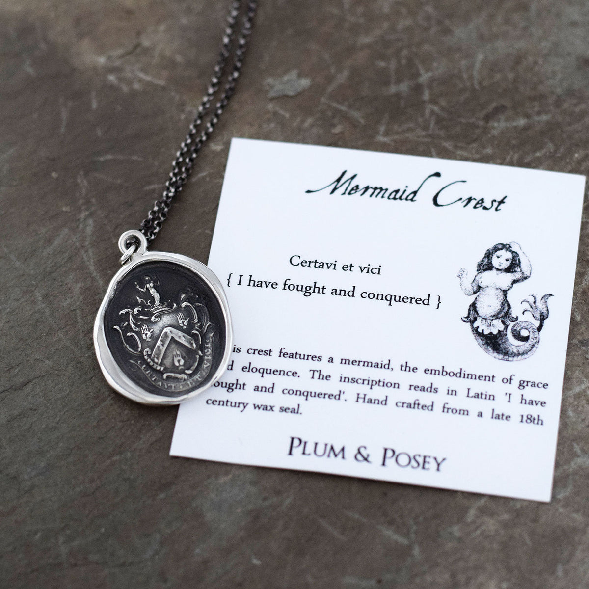 Mermaid - &#39;I have fought and conquered&#39; in bronze