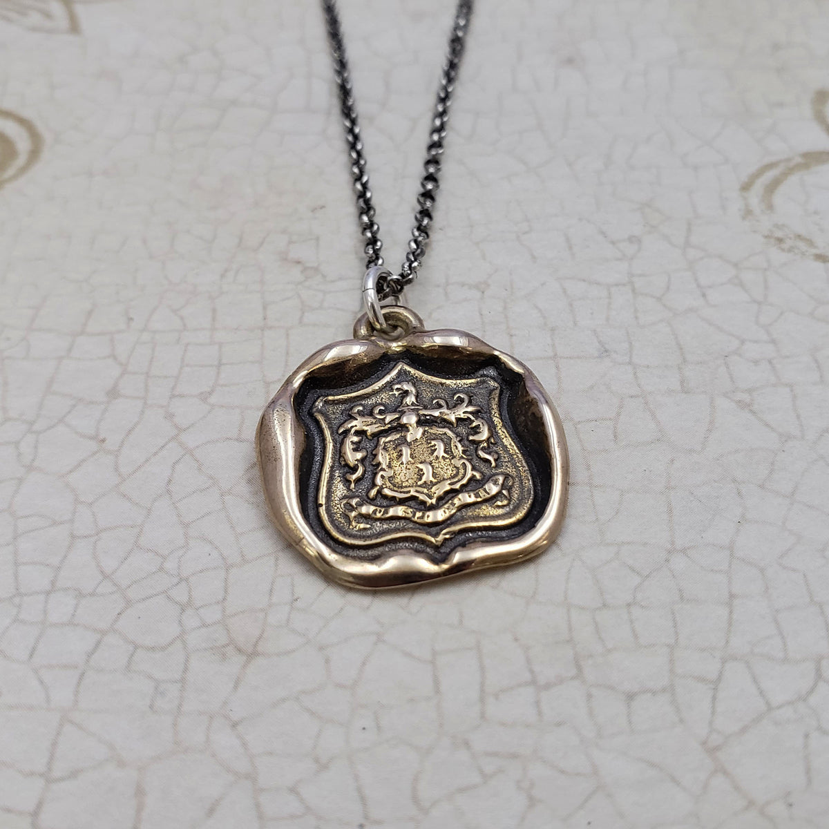 Wolf - &#39;While I Breathe I Hope&#39; in bronze