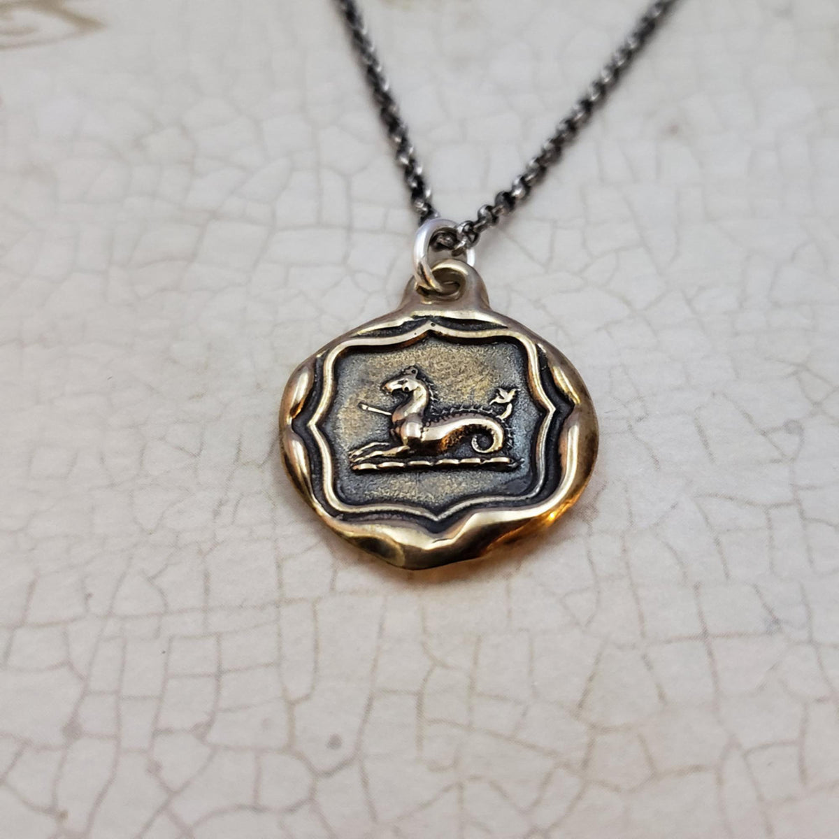 Seahorse pendant in bronze