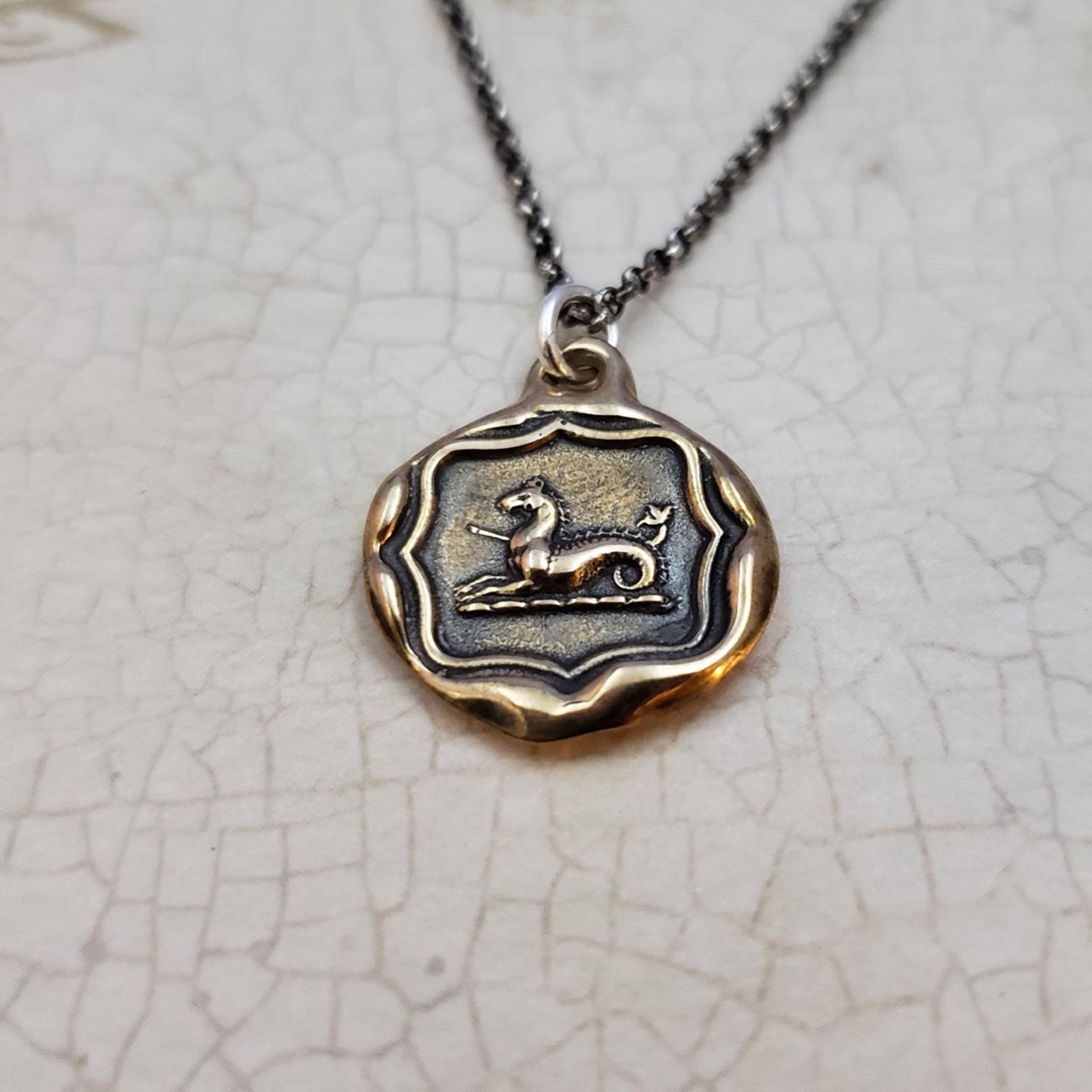 Seahorse pendant in bronze